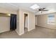 Well lit room with window, closet and partial bathroom view at 9026 W Cambridge Ave, Phoenix, AZ 85037