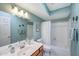 The well-lit bathroom includes a spacious vanity, toilet, and shower-tub combo at 9512 W Mcrae Way, Peoria, AZ 85382
