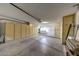 Large garage with plenty of storage cabinets and space, also including a laundry area at 9512 W Mcrae Way, Peoria, AZ 85382