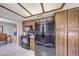 A bright kitchen featuring stainless steel appliances, wooden cabinets, and ample counter space at 9512 W Mcrae Way, Peoria, AZ 85382