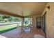 Comfortable covered patio is ideal for outdoor entertaining, with tiled floor and an open view at 9512 W Mcrae Way, Peoria, AZ 85382