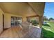 Spacious covered patio with tile flooring and ample room for seating, ideal for outdoor entertaining at 9512 W Mcrae Way, Peoria, AZ 85382