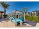 Relaxing poolside cabanas furnished with comfortable lounge seating offer a private retreat in a stylish and serene outdoor space at 100 W Northern Ave # 8, Phoenix, AZ 85021