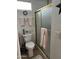 Bathroom with a toilet, gold-framed shower, and towel rack at 1001 S Prospector Dr # 1001, Apache Junction, AZ 85119