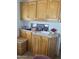 Features a large countertop with upper and lower cabinets and a built in sink at 1001 S Prospector Dr # 1001, Apache Junction, AZ 85119