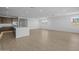 Open-concept living space with light wood flooring and bright, natural light at 10224 E Utah Ave, Mesa, AZ 85212