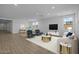 Bright and airy living room featuring modern furniture and a neutral color palette at 10224 E Utah Ave, Mesa, AZ 85212