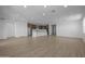 Spacious living area leading into an open kitchen with modern appliances and finishes at 10224 E Utah Ave, Mesa, AZ 85212