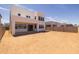 Spacious backyard with patio area on a sunny day at 10236 E Utah Ave, Mesa, AZ 85212