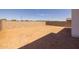 Spacious backyard with block wall fencing ready for landscaping, perfect for creating your own outdoor oasis at 10236 E Utah Ave, Mesa, AZ 85212