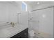 Clean bathroom featuring glass shower, modern sink and vanity at 10236 E Utah Ave, Mesa, AZ 85212
