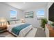 Well decorated bedroom featuring stylish decor, large windows, and comfortable furnishings at 10236 E Utah Ave, Mesa, AZ 85212