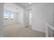Spacious bedroom with carpet flooring, bright natural lighting, and scenic views of the neighborhood at 10236 E Utah Ave, Mesa, AZ 85212