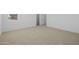 Unfurnished bedroom with carpet and bright natural lighting, awaiting your personal touch and design at 10236 E Utah Ave, Mesa, AZ 85212