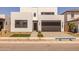 Modern two-story home with a well-maintained front yard and a two-car garage at 10236 E Utah Ave, Mesa, AZ 85212
