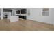 Spacious kitchen with dark cabinets, stainless steel appliances, and white quartz countertops in a new home at 10236 E Utah Ave, Mesa, AZ 85212