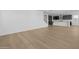 Open floor plan featuring a modern kitchen with island and a spacious living area at 10236 E Utah Ave, Mesa, AZ 85212