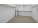 Empty walk-in closet with white walls and carpet flooring at 10236 E Utah Ave, Mesa, AZ 85212