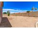 View of backyard featuring desert landscaping, a patio, and block fencing at 11266 E Dartmouth Cir, Mesa, AZ 85207