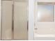 Clean bathroom with a shower and a bathtub with a big window at 11266 E Dartmouth Cir, Mesa, AZ 85207