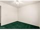 Empty bedroom with a ceiling fan and neutral walls, offering a blank canvas for personalization at 11266 E Dartmouth Cir, Mesa, AZ 85207
