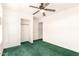 Standard Bedroom featuring a ceiling fan and a closet with sliding doors at 11266 E Dartmouth Cir, Mesa, AZ 85207