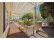 Beautiful backyard with a covered patio, well-kept landscaping, and hardscape elements for low-maintenance living at 13134 W Los Bancos Ct, Sun City West, AZ 85375