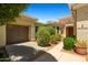 Attractive single-story home showcasing a well-maintained yard and a cozy front entrance at 13134 W Los Bancos Ct, Sun City West, AZ 85375