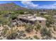 Stunning aerial view of home, showcasing the exterior design, landscaping, and surrounding neighborhood in a desert landscape at 1401 E Boulder Pass Pass, Carefree, AZ 85377