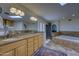 Luxurious bathroom with dual sink vanity, soaking tub, and separate shower at 1401 E Boulder Pass Pass, Carefree, AZ 85377