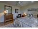 Spacious bedroom featuring a comfortable bed and dark wood furniture at 1401 E Boulder Pass Pass, Carefree, AZ 85377