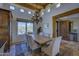 Charming dining room with high ceilings, chandelier, and a rustic wooden table at 1401 E Boulder Pass Pass, Carefree, AZ 85377