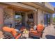 Cozy outdoor seating area with fireplace and picturesque desert views, ideal for relaxation and enjoying the tranquil surroundings at 1401 E Boulder Pass Pass, Carefree, AZ 85377