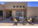 Inviting front porch featuring comfortable outdoor seating with desert landscaping and views at 1401 E Boulder Pass Pass, Carefree, AZ 85377