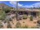 Lovely back yard with comfortable patio seating area and a built-in BBQ grill at 1401 E Boulder Pass Pass, Carefree, AZ 85377