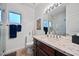 Well-lit bathroom with a sleek vanity, modern fixtures, and elegant marble finishes in the shower at 15221 N Clubgate Dr # 2065, Scottsdale, AZ 85254