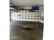 Garage offers ample storage with built-in shelving units at 15221 N Clubgate Dr # 2065, Scottsdale, AZ 85254