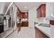 Open kitchen boasts stainless steel appliances and wood cabinets at 15221 N Clubgate Dr # 2065, Scottsdale, AZ 85254