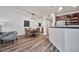 Inviting living room and dining area with hardwood floors, lots of natural light, and modern decor at 15221 N Clubgate Dr # 2065, Scottsdale, AZ 85254