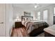 Light-filled main bedroom features a king bed and access to the patio at 15221 N Clubgate Dr # 2065, Scottsdale, AZ 85254