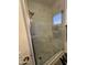 Glass enclosed walk-in shower features marble-tiled walls and floors with a rain-style shower head at 15221 N Clubgate Dr # 2065, Scottsdale, AZ 85254