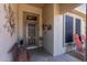 Cozy front porch with seating and decor, providing a welcoming entrance to the home at 15797 W Cinnabar Dr, Surprise, AZ 85374