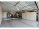 Spacious garage with epoxy floors and lots of storage space at 15797 W Cinnabar Dr, Surprise, AZ 85374