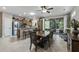 Open kitchen with stainless steel appliances, center island and adjacent dining area providing a stylish space for cooking and entertaining at 15797 W Cinnabar Dr, Surprise, AZ 85374