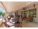 Covered patio space with ceiling fan and an array of seating options at 15797 W Cinnabar Dr, Surprise, AZ 85374