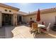 Private courtyard with patio furniture, ideal for dining or relaxation at 15797 W Cinnabar Dr, Surprise, AZ 85374
