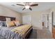 Comfortable bedroom with natural light, closet, and a ceiling fan at 15812 W Lisbon Ln, Surprise, AZ 85379