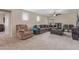Inviting living room features plush seating, neutral decor, and a cozy atmosphere perfect for relaxation at 15812 W Lisbon Ln, Surprise, AZ 85379