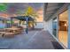 Backyard patio with a built in outdoor kitchen and dining area at 1644 W Roma Ave, Phoenix, AZ 85015