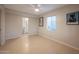 Bedroom features tile flooring, a ceiling fan and a window with blinds at 1644 W Roma Ave, Phoenix, AZ 85015